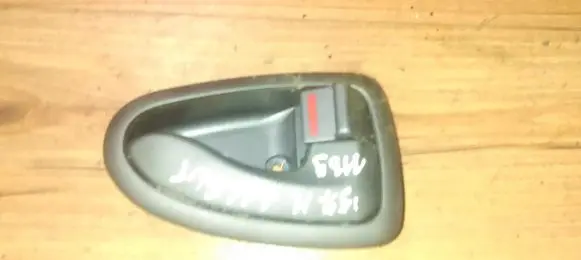 Hyundai Accent Front door interior handle
