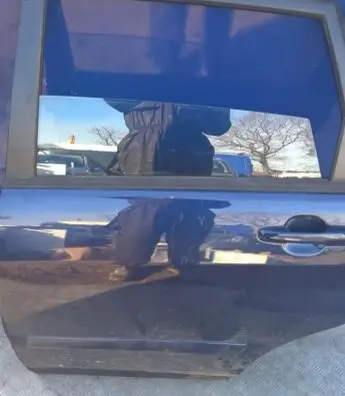 Suzuki Liana Rear door