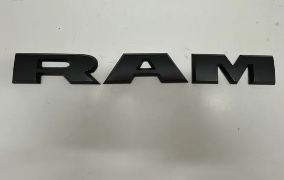 Ram 1500 Front door emblem/model letters 68302528AA 68309785AA