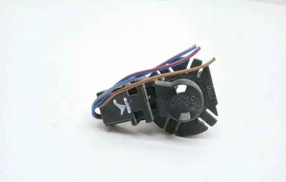 Tail light bulb cover holder
