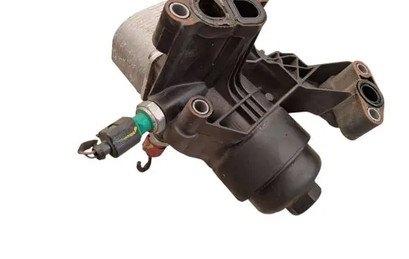Volkswagen Golf VII Oil filter mounting bracket 03N117021