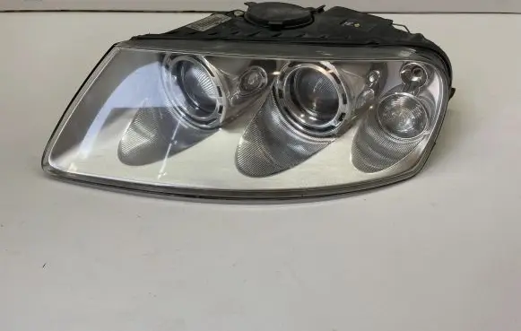 Volkswagen Touareg I Headlight/headlamp 89307851 7L6941015