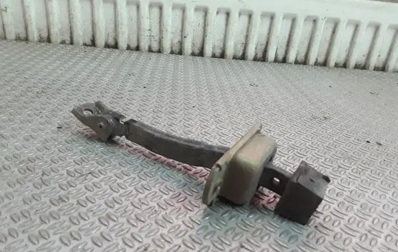 Mitsubishi Pajero Rear door check strap stopper
