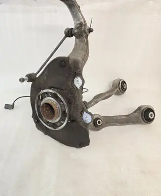 Front wheel hub spindle knuckle