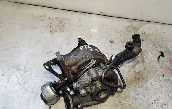Nissan Primera Turbo 14411AU600 7258641