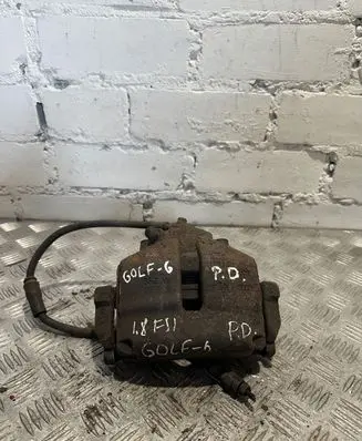 Volkswagen Golf VI Front brake caliper