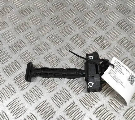 Front door check strap stopper