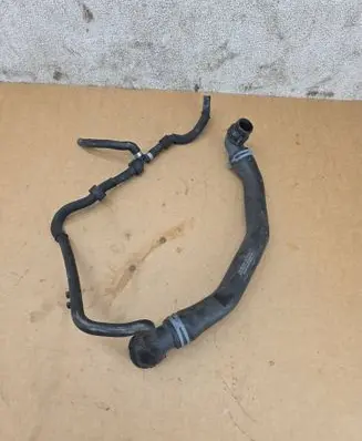 Volkswagen Golf VII Engine coolant pipe/hose 5Q0122101GG