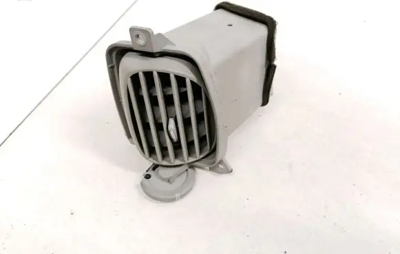 Nissan Almera Tino Dash center air vent grill 68760BU200 68760BU201