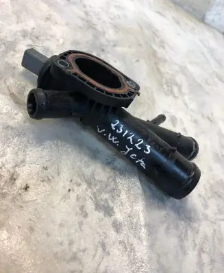 Thermostat/thermostat housing