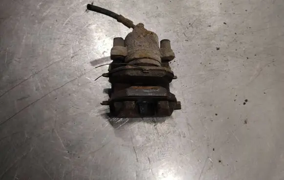 Volkswagen Golf VI Front brake caliper