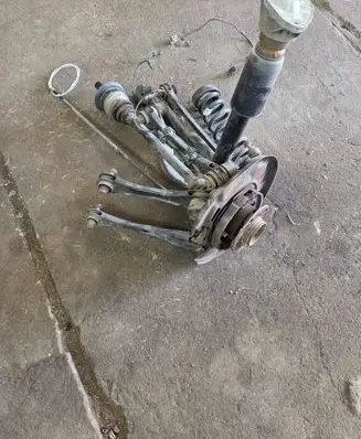Rear wheel hub spindle/knuckle