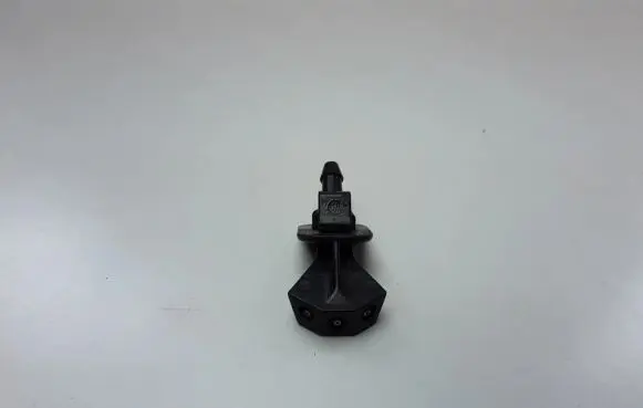 Windshield washer spray nozzle