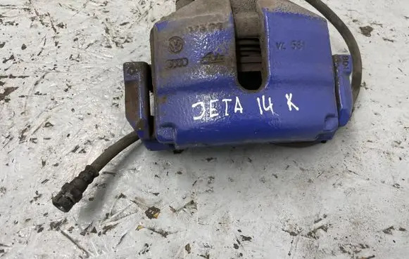 Volkswagen Jetta VI Front brake caliper
