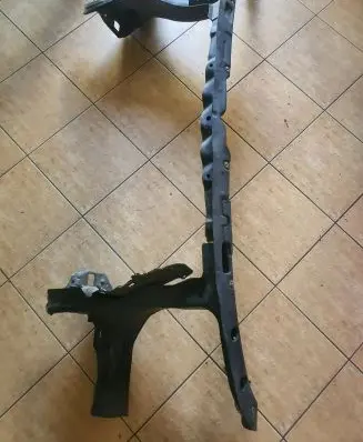 Radiator support slam panel