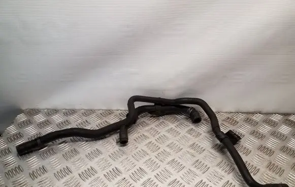 Volkswagen PASSAT B7 Engine coolant pipe/hose 1K0133687