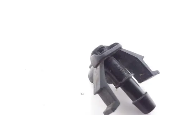 Windshield washer spray nozzle
