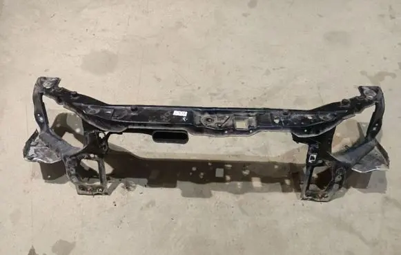 Radiator support slam panel