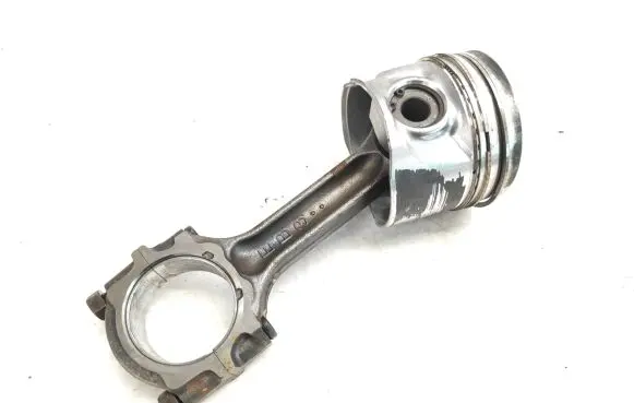 Piston with connecting rod