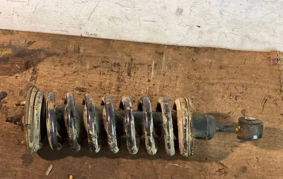 Front shock absorber with coil spring