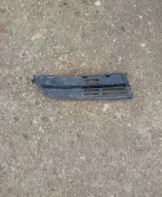 Volkswagen Touran I Front bumper lower grill 1T0853665
