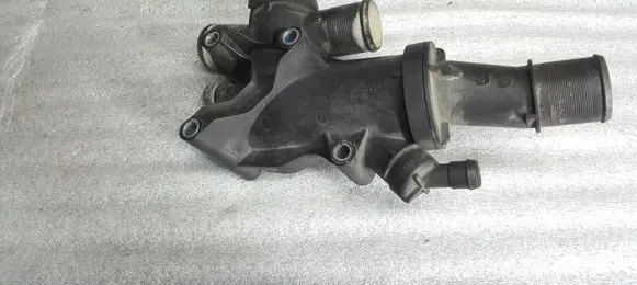 Thermostat/thermostat housing