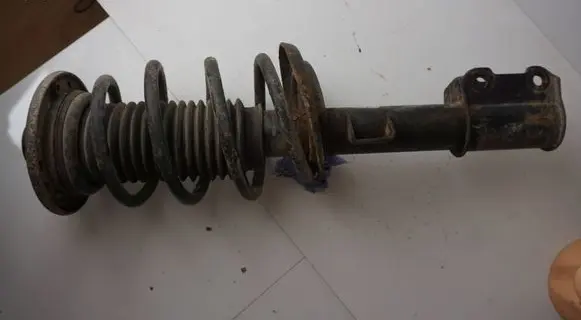Saab 9-3 Ver2 Front shock absorber with coil spring 334669 24435885 12188764
