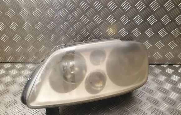 Volkswagen Touran I Headlight/headlamp 1T0941005F