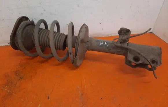 Toyota Corolla E110 Front shock absorber with coil spring