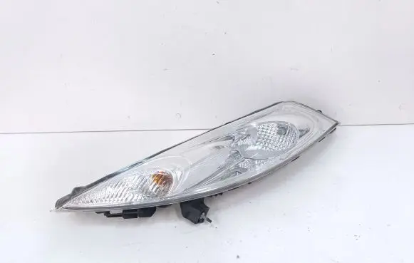 Nissan Juke I F15 Headlight/headlamp