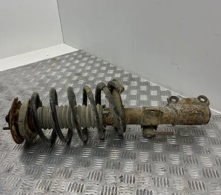 Front shock absorber with coil spring