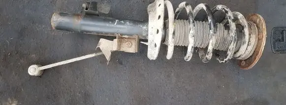 Front shock absorber with coil spring