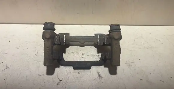 Skoda Superb B6 (3T) Brake caliper pad carrier rear 5K0615425