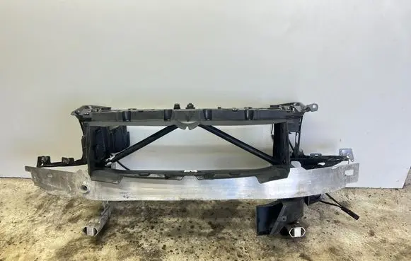 Top upper radiator support slam panel