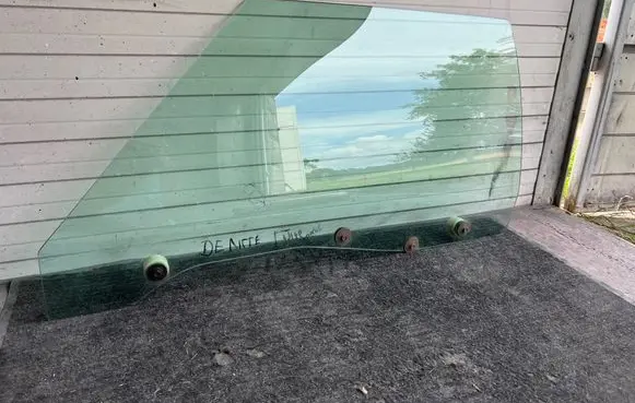 Cadillac DeVille Front door window/glass (coupe) 