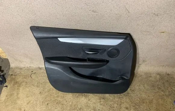 Front door card panel trim