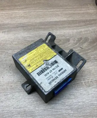 Mazda 323 F Airbag control unit/module BC1M57K30 12192661