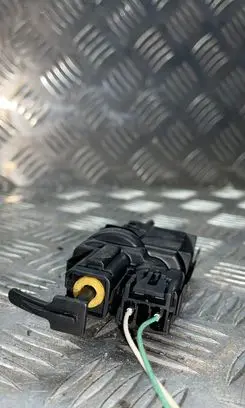 Fuel tank cap lock motor
