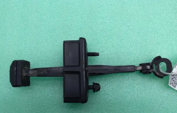 Rear door check strap stopper