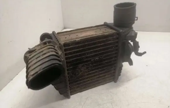 Volkswagen Golf IV Intercooler radiator 1J0145803