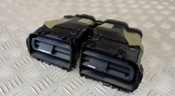 Dash center air vent grill