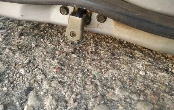 Nissan Almera Tino Front door check strap stopper 