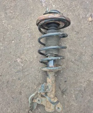 Nissan Primera Front shock absorber with coil spring