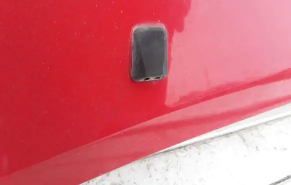 Windshield washer spray nozzle