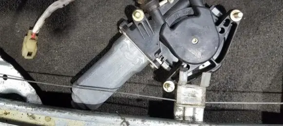 Front door window regulator motor