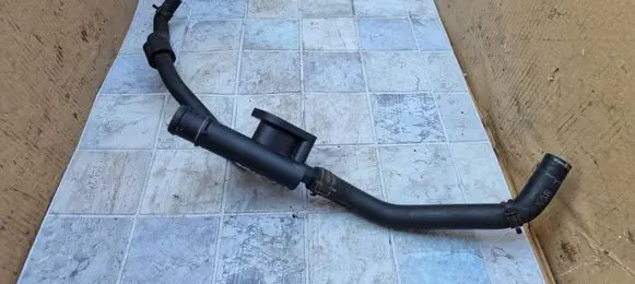 Volkswagen Touran I Engine coolant pipe/hose 038121132D 1K0121157AG 1K0121096AB