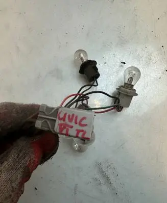 Honda Civic Tail light bulb cover holder 754534634