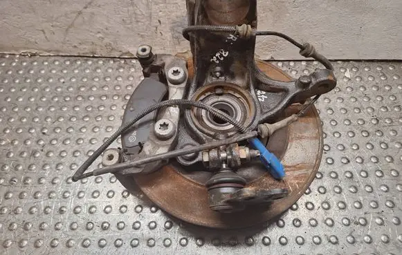 Front wheel hub spindle knuckle