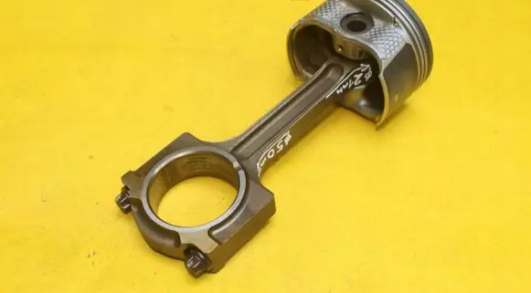 Piston with connecting rod