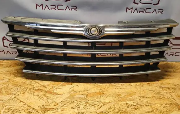 Chrysler Voyager Front bumper upper radiator grill 04857804AB
